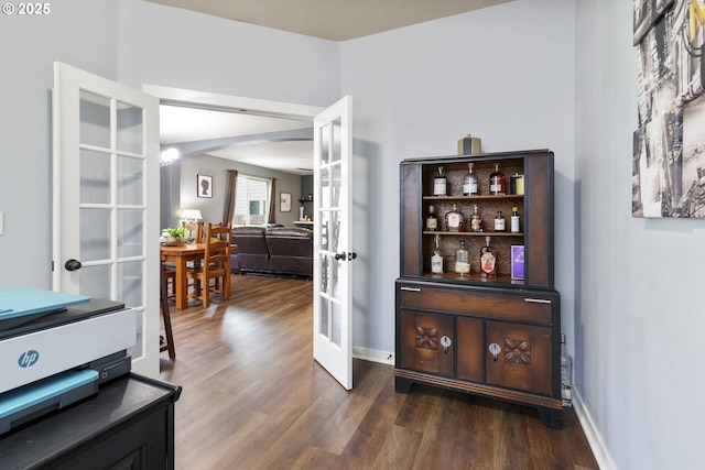 4219 NE 157th Ct, Vancouver, WA 98682 - interior space featuring arched walkways, french doors, wood finished floors, and baseboards