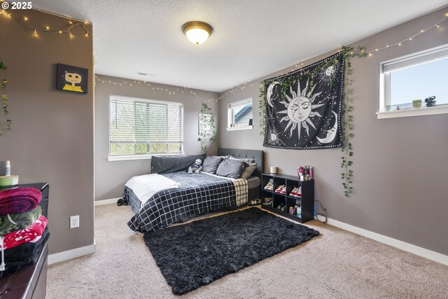 4219 NE 157th Ct, Vancouver, WA 98682 - carpeted bedroom with baseboards and visible vents