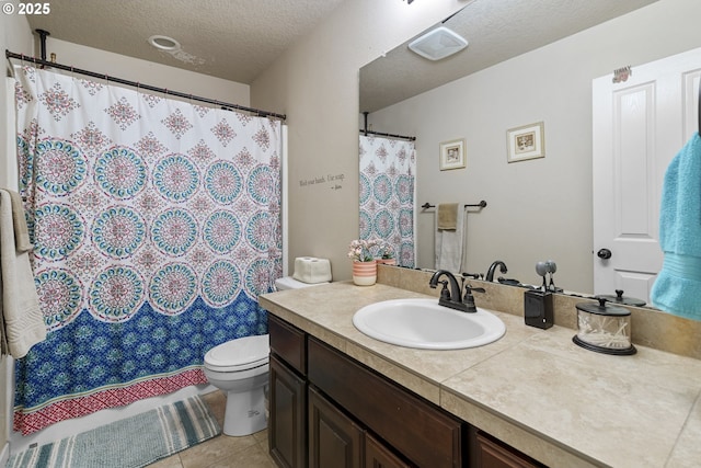 4219 NE 157th Ct, Vancouver, WA 98682 - full bath with curtained shower, toilet, a textured ceiling, vanity, and tile patterned floors