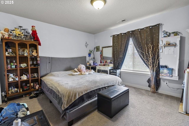 4219 NE 157th Ct, Vancouver, WA 98682 - carpeted bedroom featuring visible vents, a textured ceiling, and baseboards