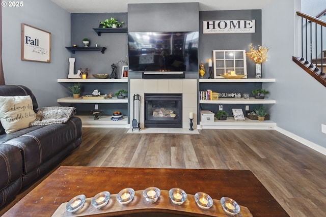 4219 NE 157th Ct, Vancouver, WA 98682 - living room featuring a fireplace, wood finished floors, and stairs