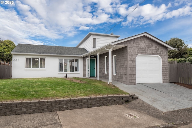 view of front of home with a garage, concrete driveway, and roof with shingles