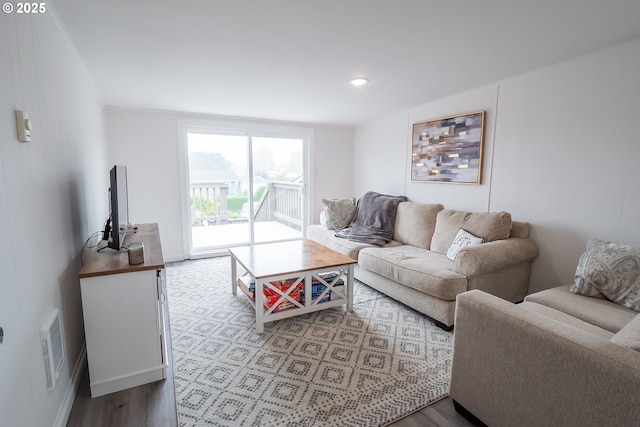 living room with wood finished floors