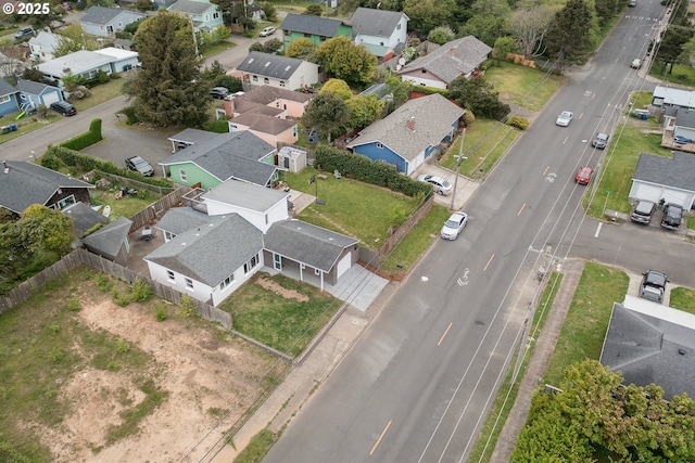 aerial view of property's location with nearby suburban area