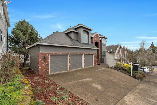 view of property exterior featuring driveway, an attached garage, a shingled roof, and brick siding