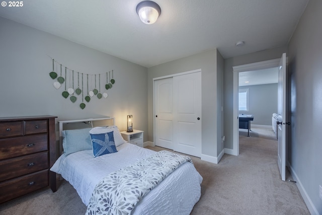 1852 SE Oar Dr, Lincoln City, OR 97367 - bedroom with light colored carpet, a closet, and baseboards