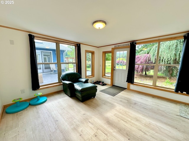 38434 Mckenzie Hwy, Springfield, OR 97478 - living area with baseboards, wood finished floors, and crown molding