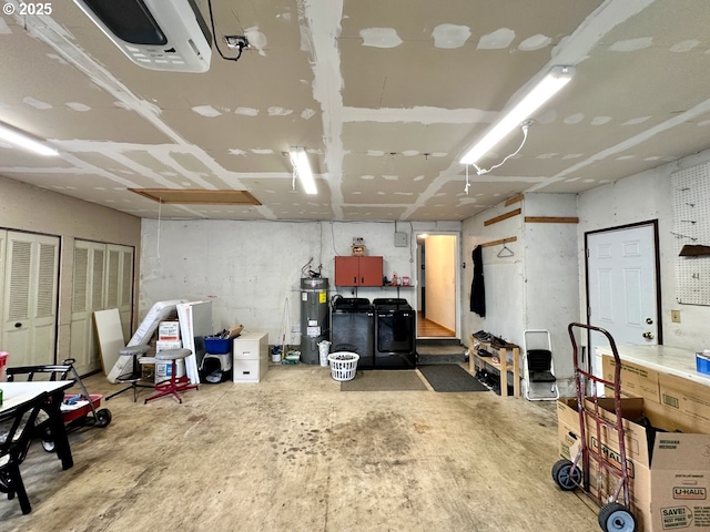 38434 Mckenzie Hwy, Springfield, OR 97478 - garage with electric water heater and separate washer and dryer