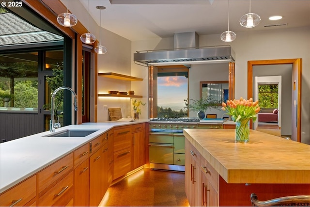 321 NW Hilltop Dr, Portland, OR 97210 - kitchen with a sink, wall chimney exhaust hood, butcher block countertops, pendant lighting, and open shelves