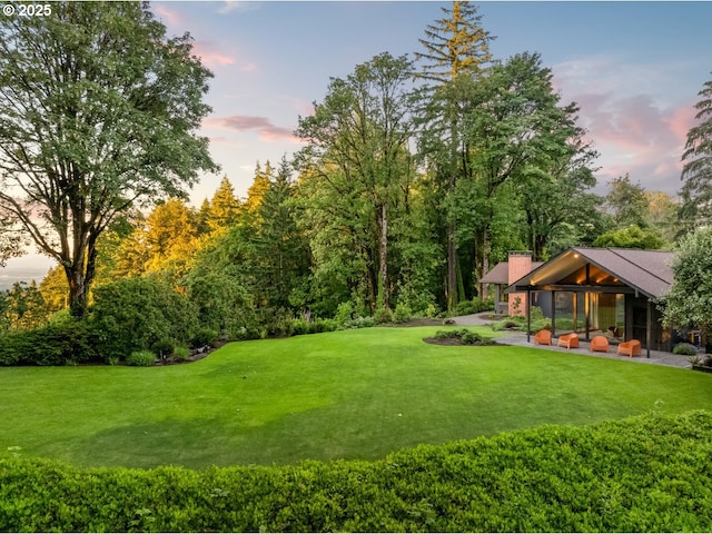 321 NW Hilltop Dr, Portland, OR 97210 - yard at dusk with a lawn