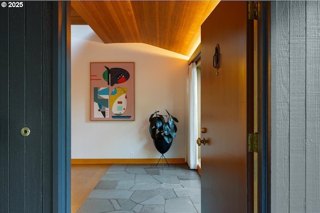 321 NW Hilltop Dr, Portland, OR 97210 - corridor with lofted ceiling, wood ceiling, and baseboards