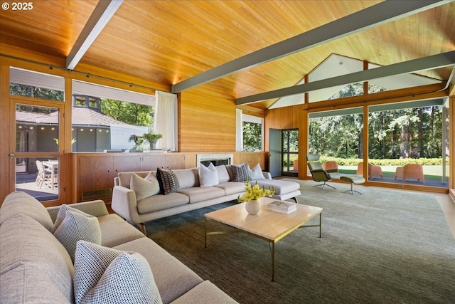 321 NW Hilltop Dr, Portland, OR 97210 - living room featuring wood ceiling with exposed beams, healthy amount of natural light, high vaulted ceiling, and wooden walls