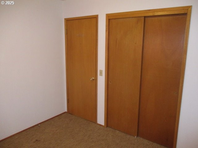 1210 Alder St, Elgin, OR 97827 - unfurnished bedroom with carpet and a closet