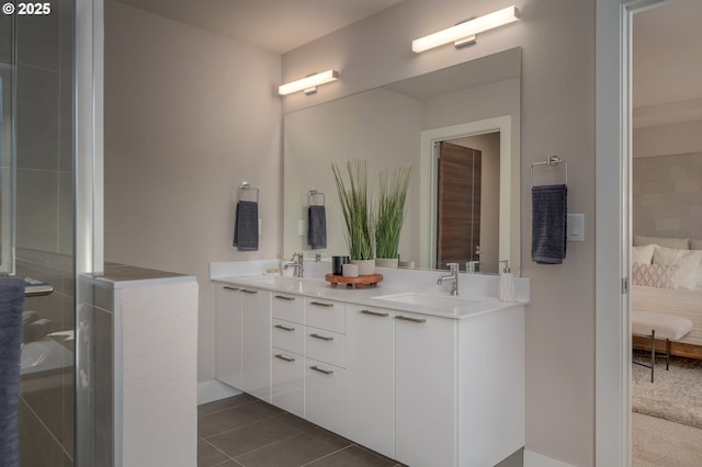 bathroom with vanity and tile patterned floors