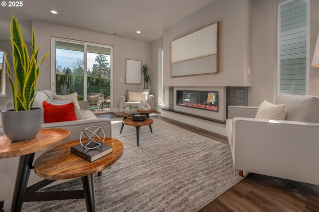 living room with dark hardwood / wood-style floors