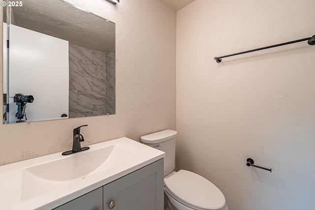 823 20th St, Springfield, OR 97477 - half bath featuring vanity and a textured wall