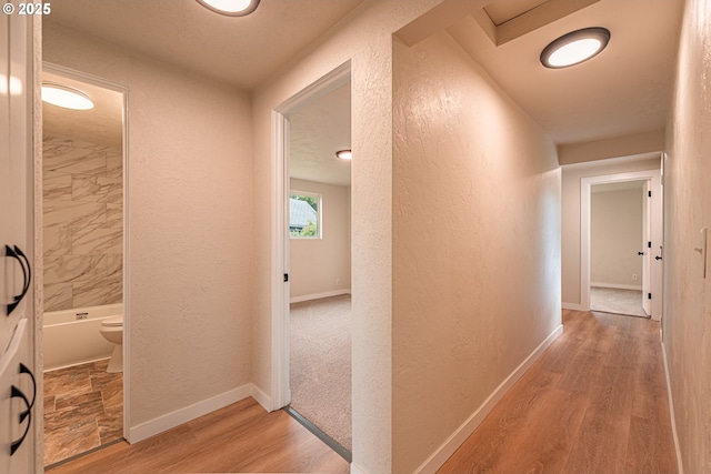 823 20th St, Springfield, OR 97477 - hall with a textured wall and light wood-style floors