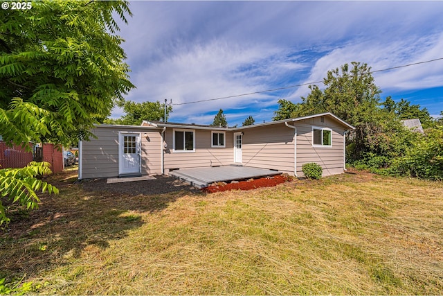 823 20th St, Springfield, OR 97477 - rear view of house featuring a lawn and a deck