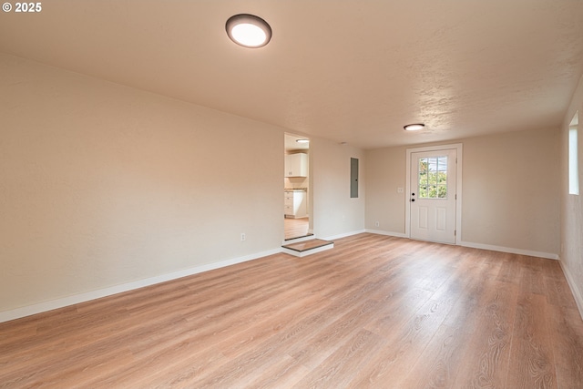 823 20th St, Springfield, OR 97477 - empty room with light wood-style floors and electric panel