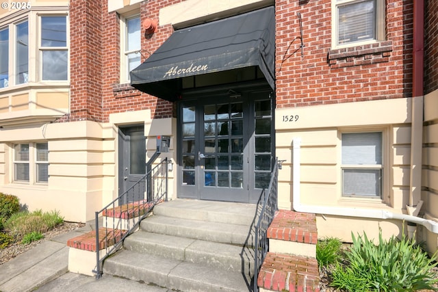 1529 SE Hawthorne Blvd Unit 204, Portland, OR 97214 - property entrance with brick siding and french doors