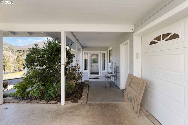 view of patio with a garage