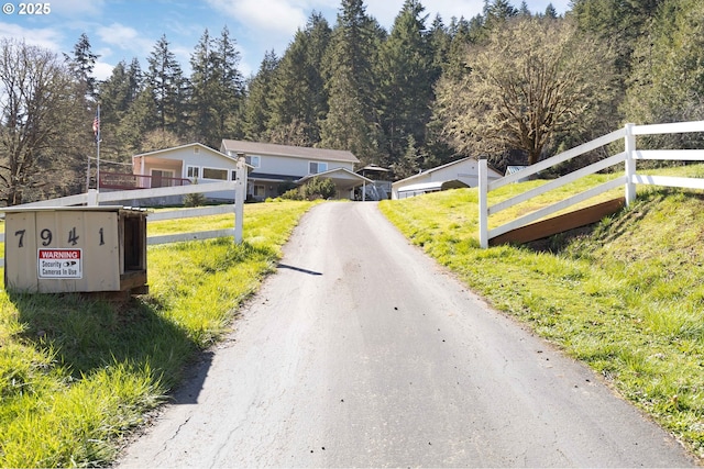 view of road featuring driveway