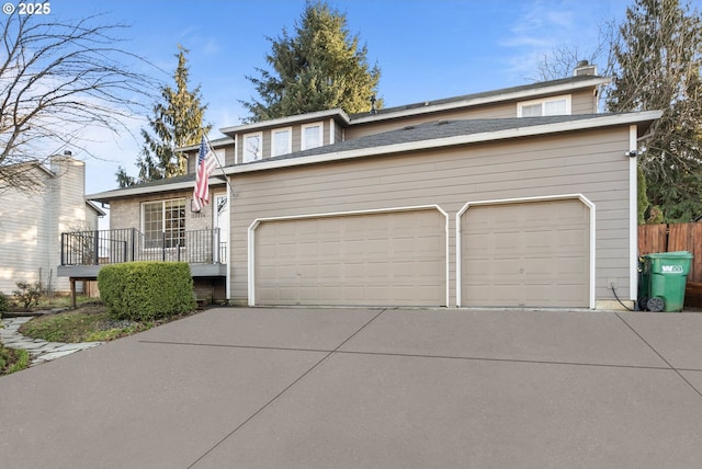 view of front facade featuring a garage and concrete driveway