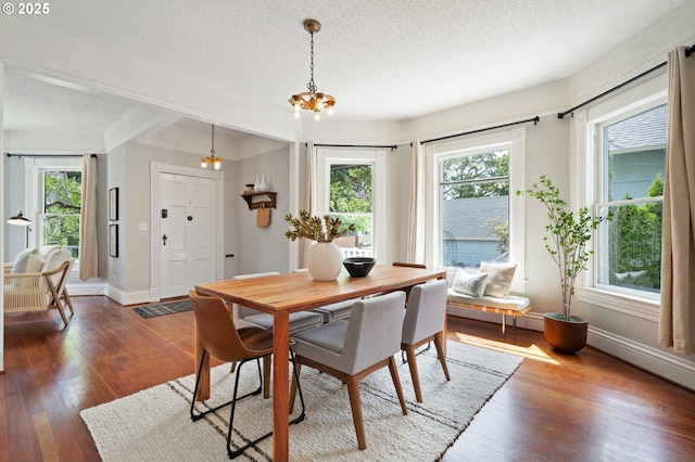 1905 N Sumner St, Portland, OR 97217 - dining area featuring wood-type flooring and a chandelier