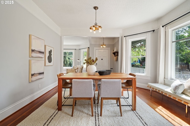 1905 N Sumner St, Portland, OR 97217 - dining room with light wood finished floors and baseboards