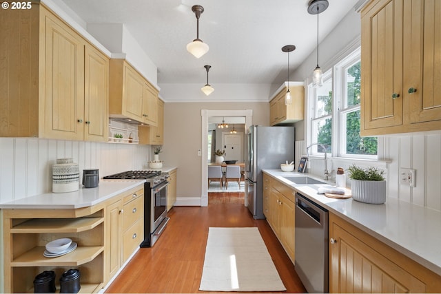 1905 N Sumner St, Portland, OR 97217 - kitchen with appliances with stainless steel finishes, light brown cabinets, dark wood-type flooring, open shelves, and light countertops