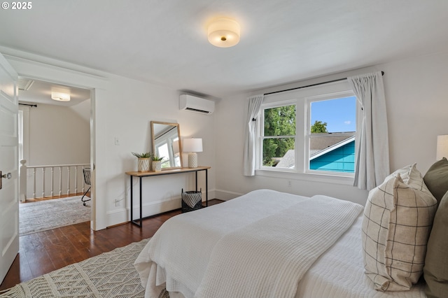 1905 N Sumner St, Portland, OR 97217 - bedroom with an AC wall unit and wood-type flooring
