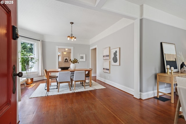 1905 N Sumner St, Portland, OR 97217 - dining area with dark wood finished floors and a chandelier