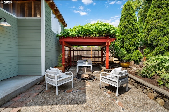 1905 N Sumner St, Portland, OR 97217 - view of patio with an outdoor fire pit and a pergola