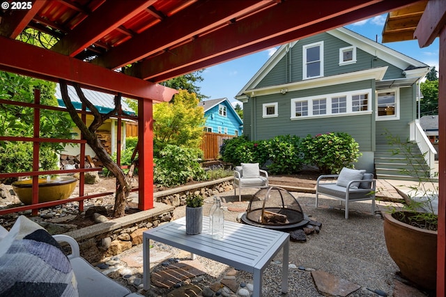 1905 N Sumner St, Portland, OR 97217 - view of patio / terrace featuring a fire pit and stairway