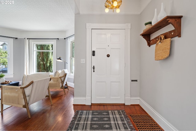1905 N Sumner St, Portland, OR 97217 - entryway with wood finished floors and baseboards