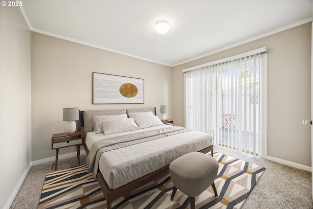 bedroom with carpet floors and crown molding