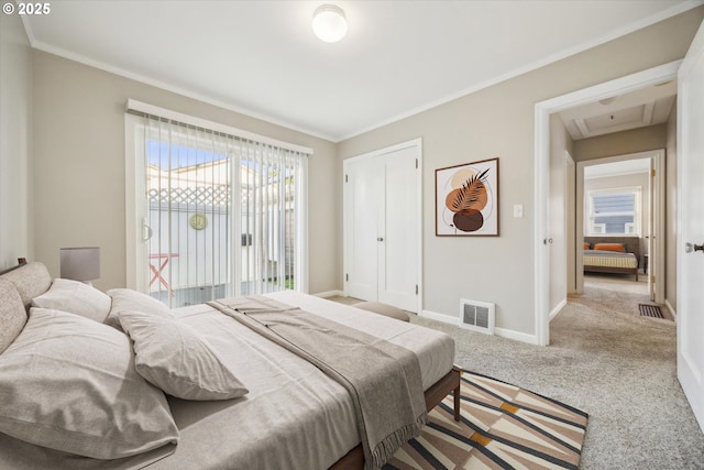 carpeted bedroom with access to outside and crown molding