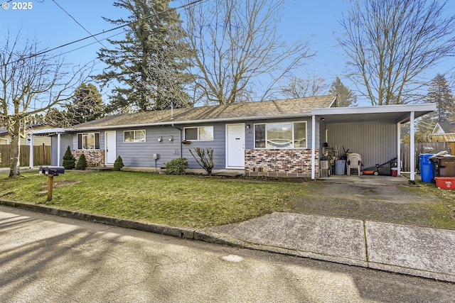 single story home featuring a carport and a front lawn