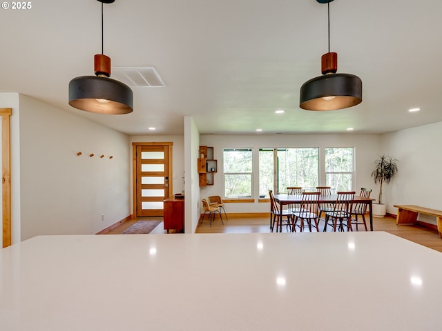 kitchen with recessed lighting, visible vents, pendant lighting, and light wood-style floors