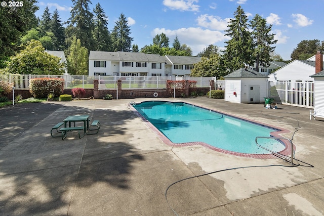 13142 SW 17th St, Beaverton, OR 97008 - community pool with a patio area, fence, and a residential view
