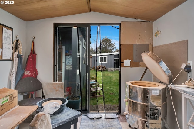 entryway featuring lofted ceiling, wooden ceiling, and electric panel