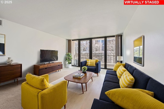 255 SW Harrison St Unit 3C, Portland, OR 97201 - living area with a wall of windows