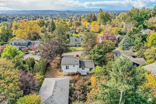 bird's eye view featuring a forest view