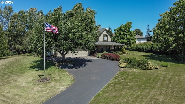 surrounding community featuring a lawn