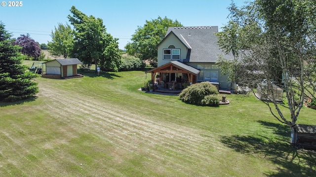 view of yard with an outbuilding and a garage