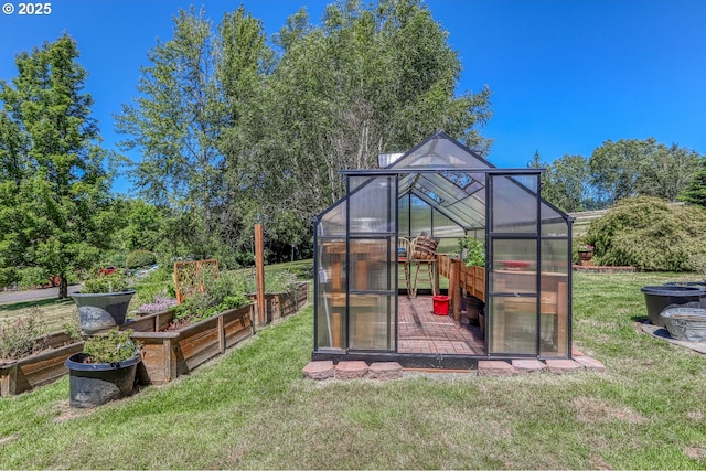 view of outdoor structure with a lawn