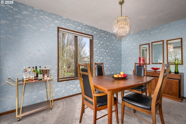 carpeted dining room with an inviting chandelier and a textured ceiling