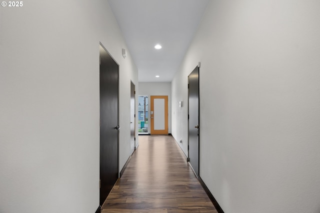 hall with recessed lighting, baseboards, and wood finished floors