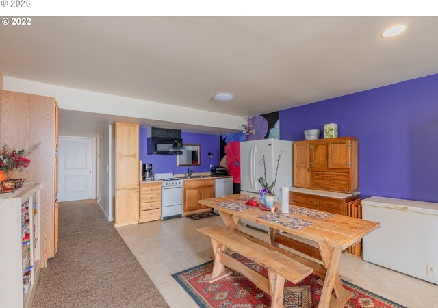 dining space with sink