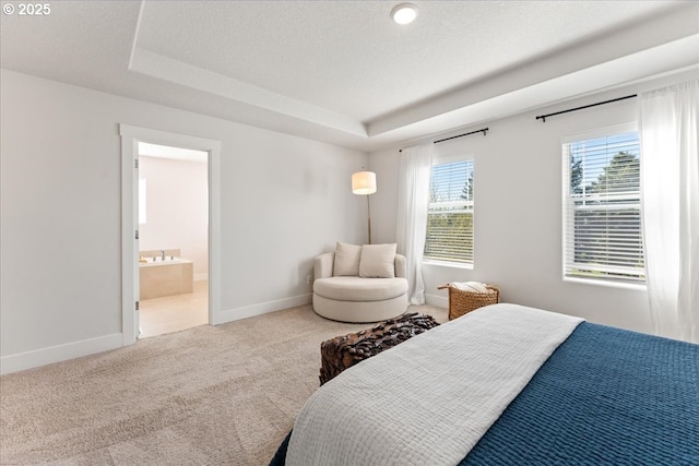 7510 NW Lauren Ave, Portland, OR 97229 - carpeted bedroom with a raised ceiling and ensuite bath